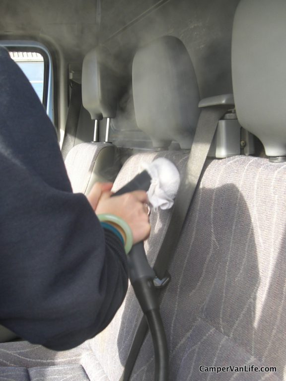 Steam cleaning the cab seats
