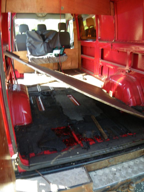Gallons of waste oil soaked under the floorboards, explains the bad smell…